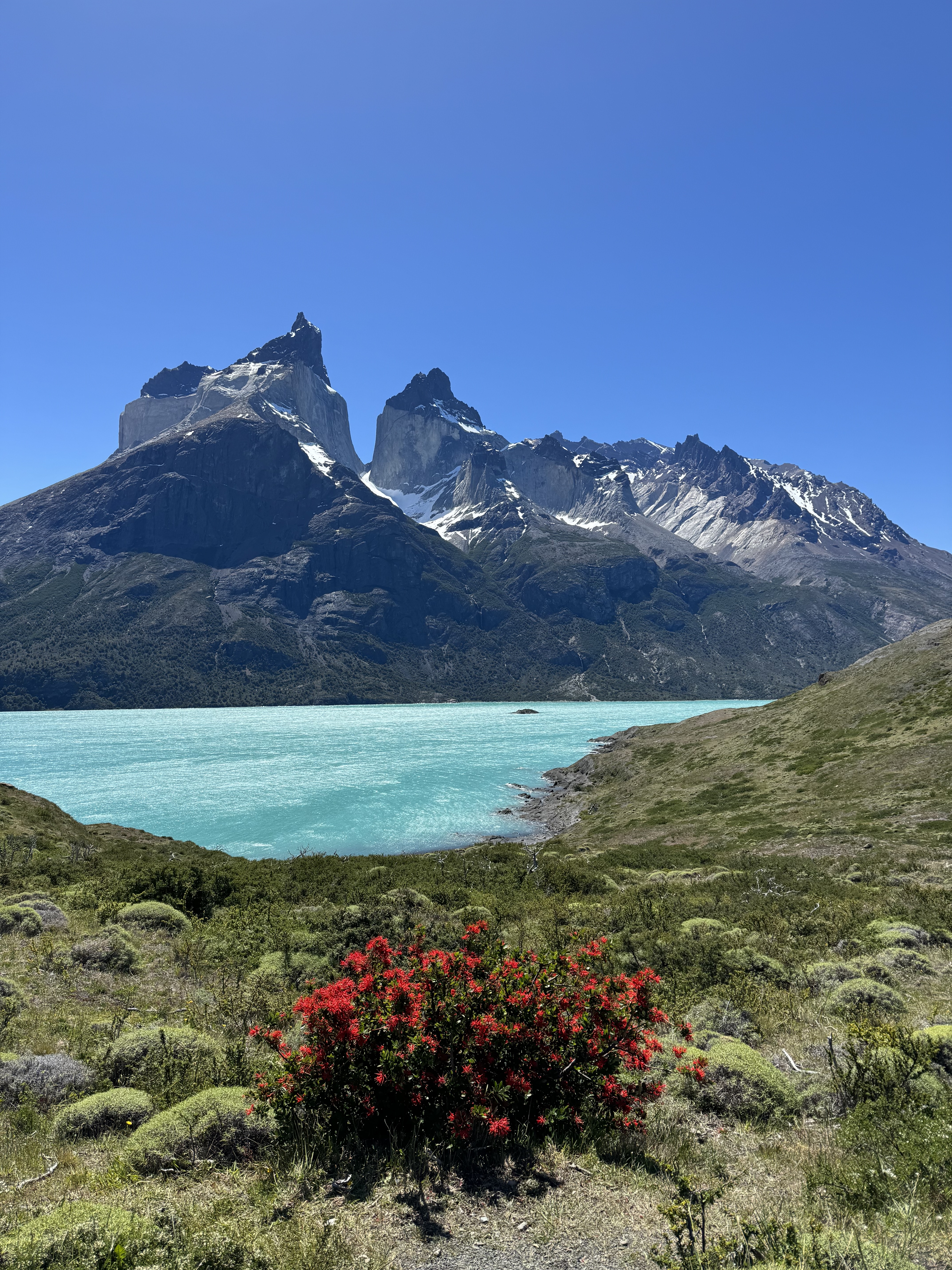 A photo of a mountain and lake