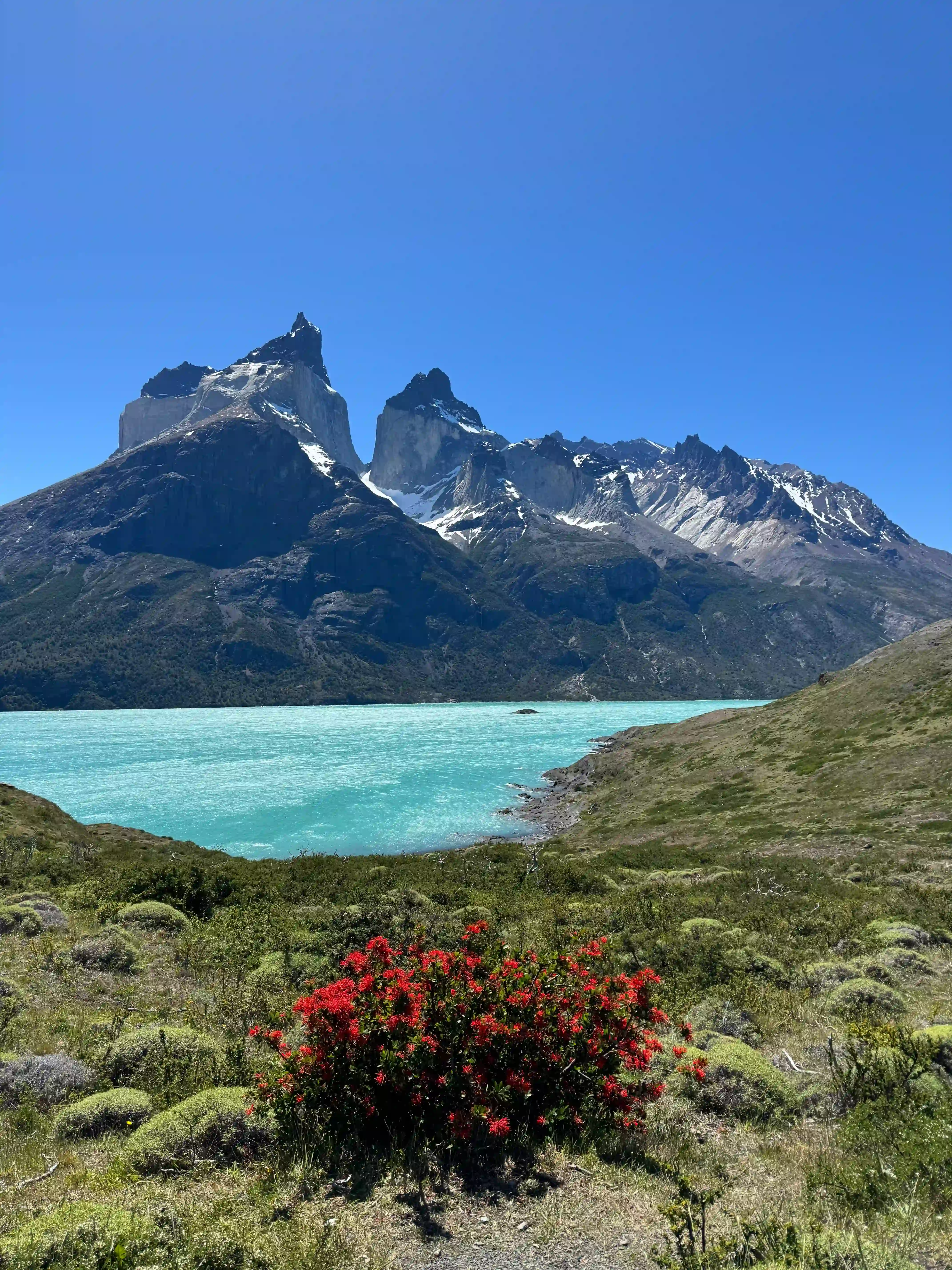 A photo of a mountain and lake