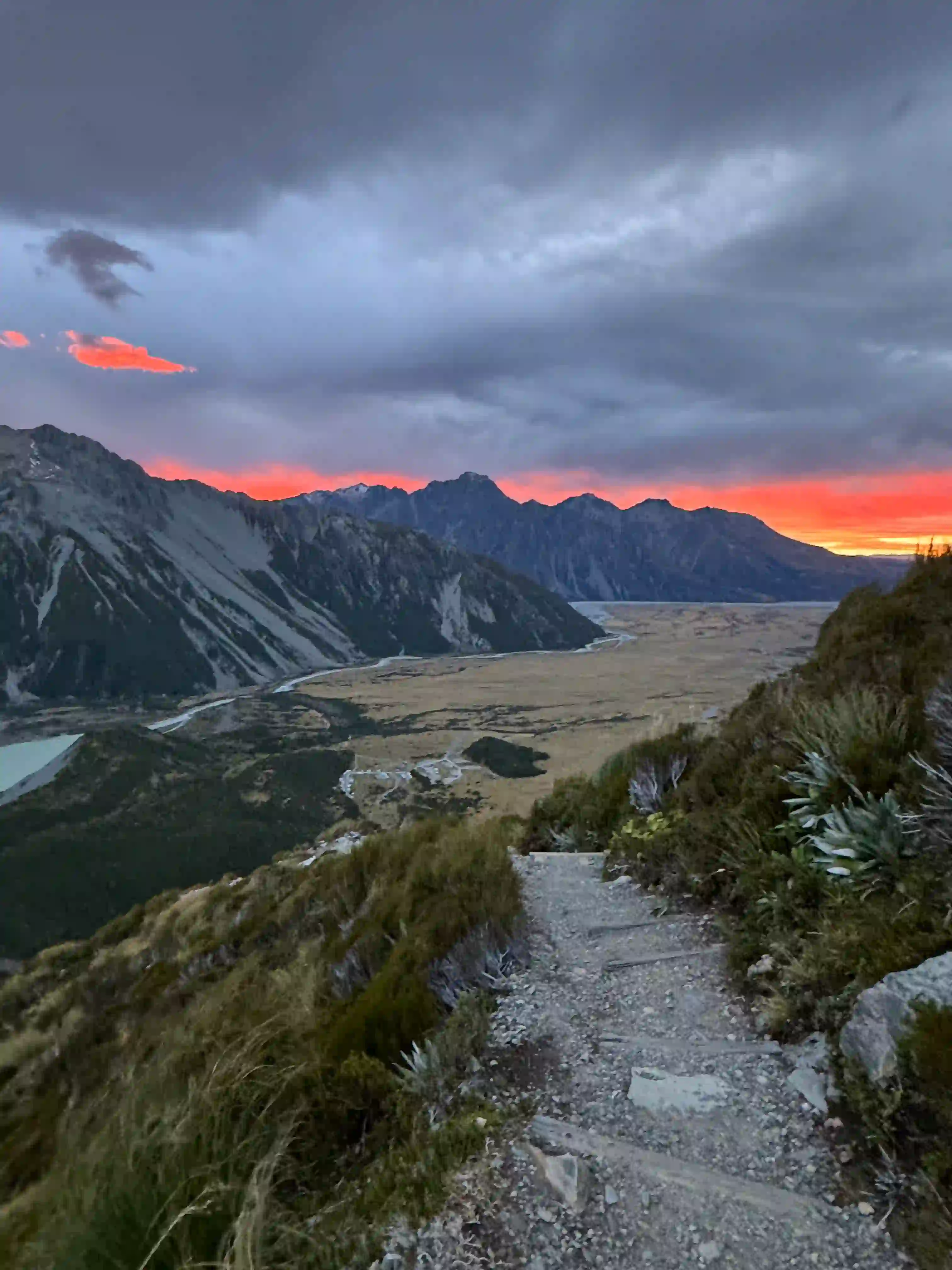 A photo of mountains and a sunset